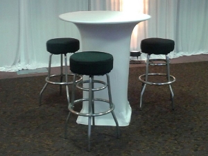 Chrome bar stools at cocktail table