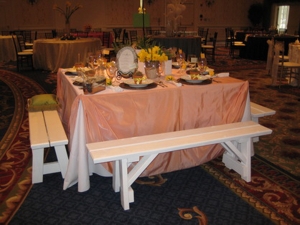 White wood benches at the table