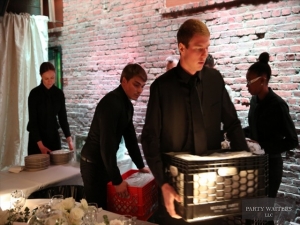 Waiters setup the ballroom