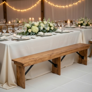 Natural wood benches at the beach wedding